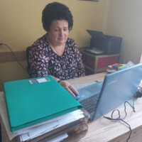 головна